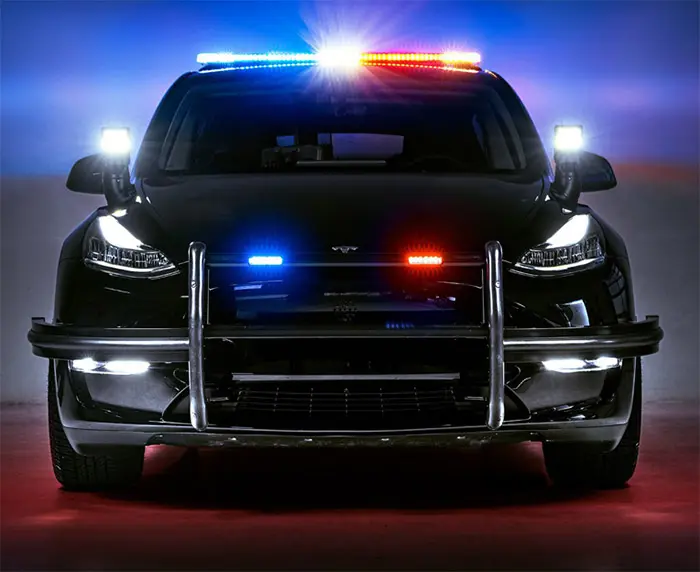 Driving Law Enforcement Forward - Front View Of UP.FIT Tesla Model Y Police Car
